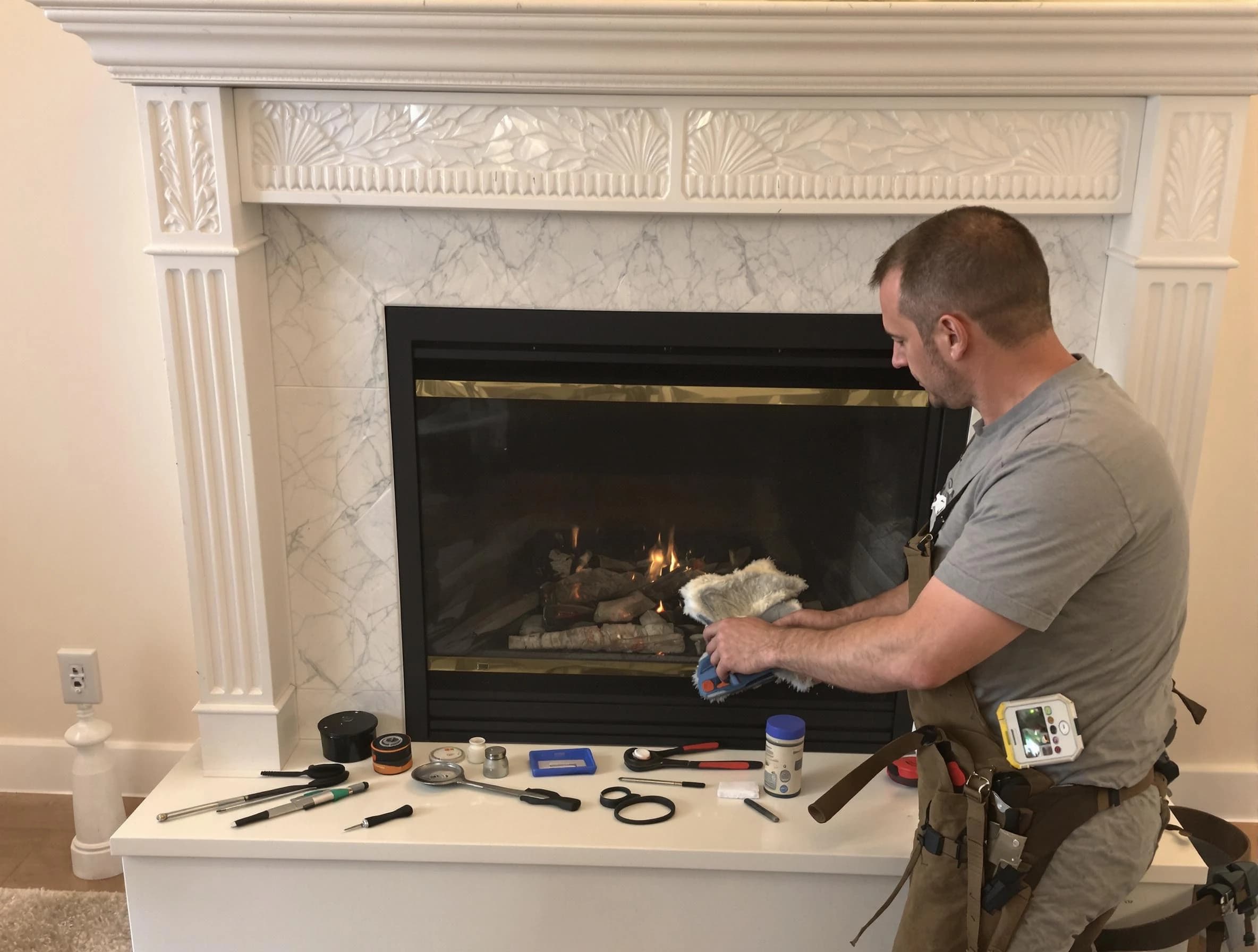Ross Chimney Sweep performing fireplace maintenance in Ross, PA